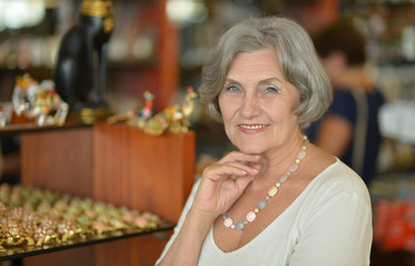 mature woman in jewelry store