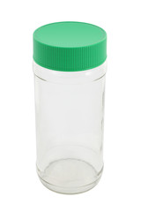 Top side of glass bottle with plastic cover on white background.