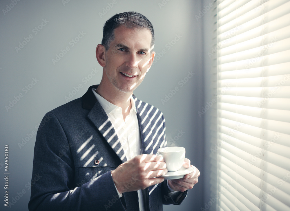 Wall mural man with cup of coffee