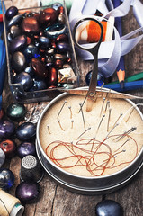 old seamstress for needlework