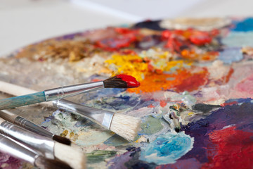 Brushes in paint