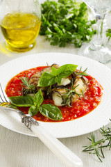 Rolled eggplant with mozzarella sauce trade winds.