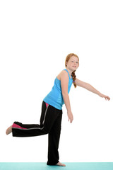 Obraz premium little girl practicing to balance
