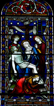 Jesus Christ removed from the cross, in stained glass