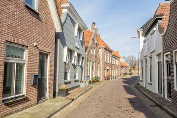 Fototapeta na wymiar Traditional Dutch houses in a smal village