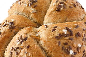 Linseed kaiser bread roll with salt crystals detail