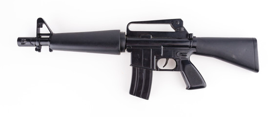 Black plastic gun isolated white background