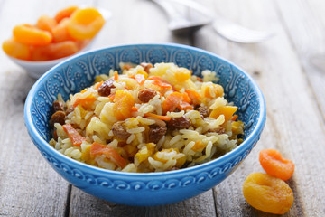 Pilaf with dried apricots and raisins