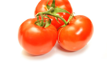 Three Fresh Ripe Tomamotes Over White