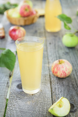 Homemade apple juica and apples