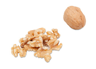 A whole walnut along with some peeled