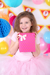 Pretty little girl celebrate her birthday