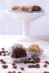 Set of chocolate candies on table on light background