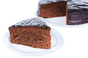 Delicious chocolate cake isolated on white