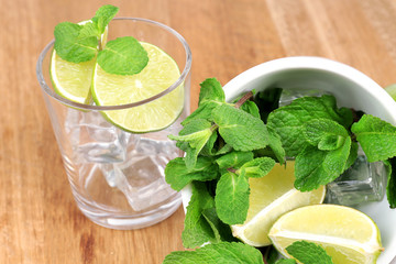 Ingredients for lemonade on wooden table
