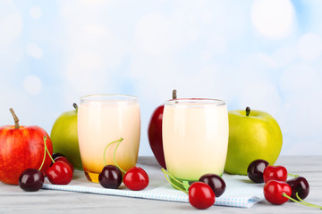 Delicious yogurt with fruits tastes in glasses and fresh fruits