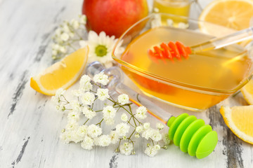 Sweet honey on wooden table