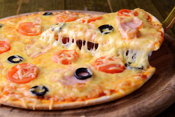 Tasty pizza on table close-up