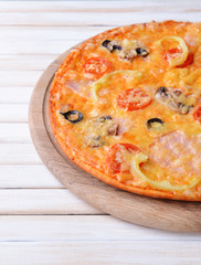 Tasty pizza on table close-up