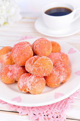 Delicious cookies peaches on table on light background