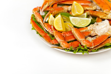 Crab legs with fresh lemon slices