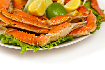 Crab legs with fresh lemon slices