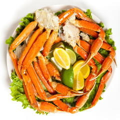 Crab legs with fresh lemon slices
