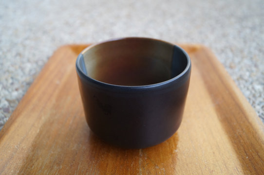 black cup on tray