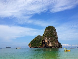 human sailing kayak boat at Railey beach, Krabi, Thailand