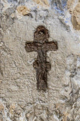 Cross sculptured in the rock