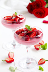 panna cotta dessert with strawberry sirup - Stock Image