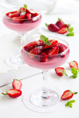 panna cotta dessert with strawberry sirup - Stock Image