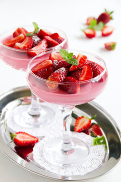 panna cotta dessert with strawberry sirup - Stock Image