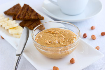 Peanut butter in a glass bowl
