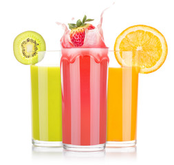 tasty summer fruit drinks in glass with splash