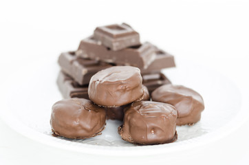 An assortment of fine chocolates in milk chocolate.