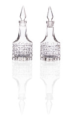 two empty glass containers for sauces