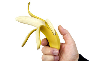Hand holding peeled banana like a gun