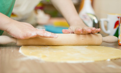 Obraz na płótnie Canvas Stretched Dough on the Kitchen Table