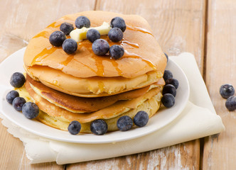 pancakes topped with honey