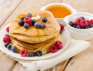 pancakes topped with honey