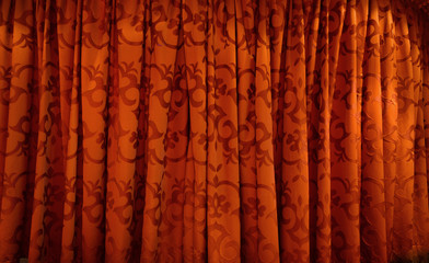 Red curtain with vertical line and side light
