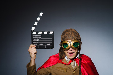 Funny pilot with goggles and helmet