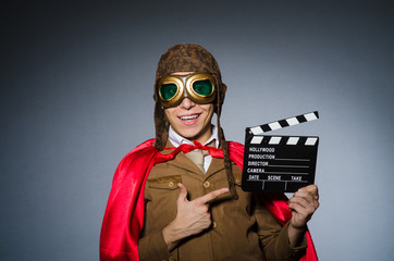 Funny pilot with goggles and helmet