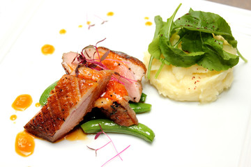 Duck breast with orange sauce and mash totato