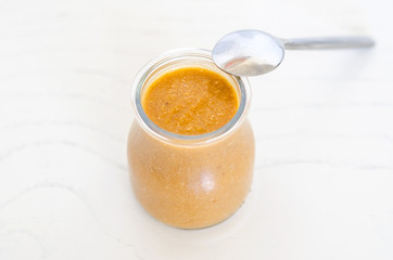 Tomato sauce on white background.