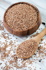 Raw buckwheat kernels, close-up, studio shot