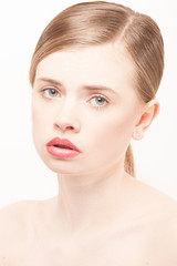 Obraz premium Portrait of beautiful young woman with clean face. High key shot