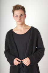 Young man in cardigan