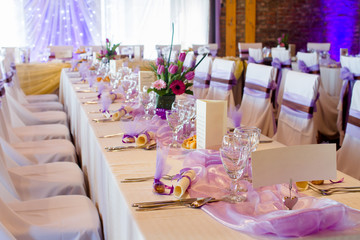 an image of tables setting at a luxury wedding hall